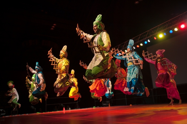 Members of the Cornell Mundey Bhangra dance team perform April 13 in Barton Hall as part of Pao Bhangra XII.